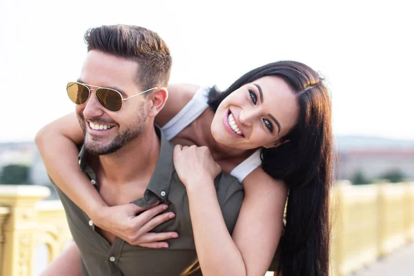 Happy Young Couple Have Fun Outdoors Piggyback Love — Stock Photo, Image