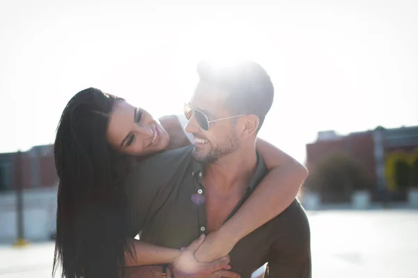 Happy Young Urban Couple Doing Piggyback Outdoors Happiness — Stock Photo, Image