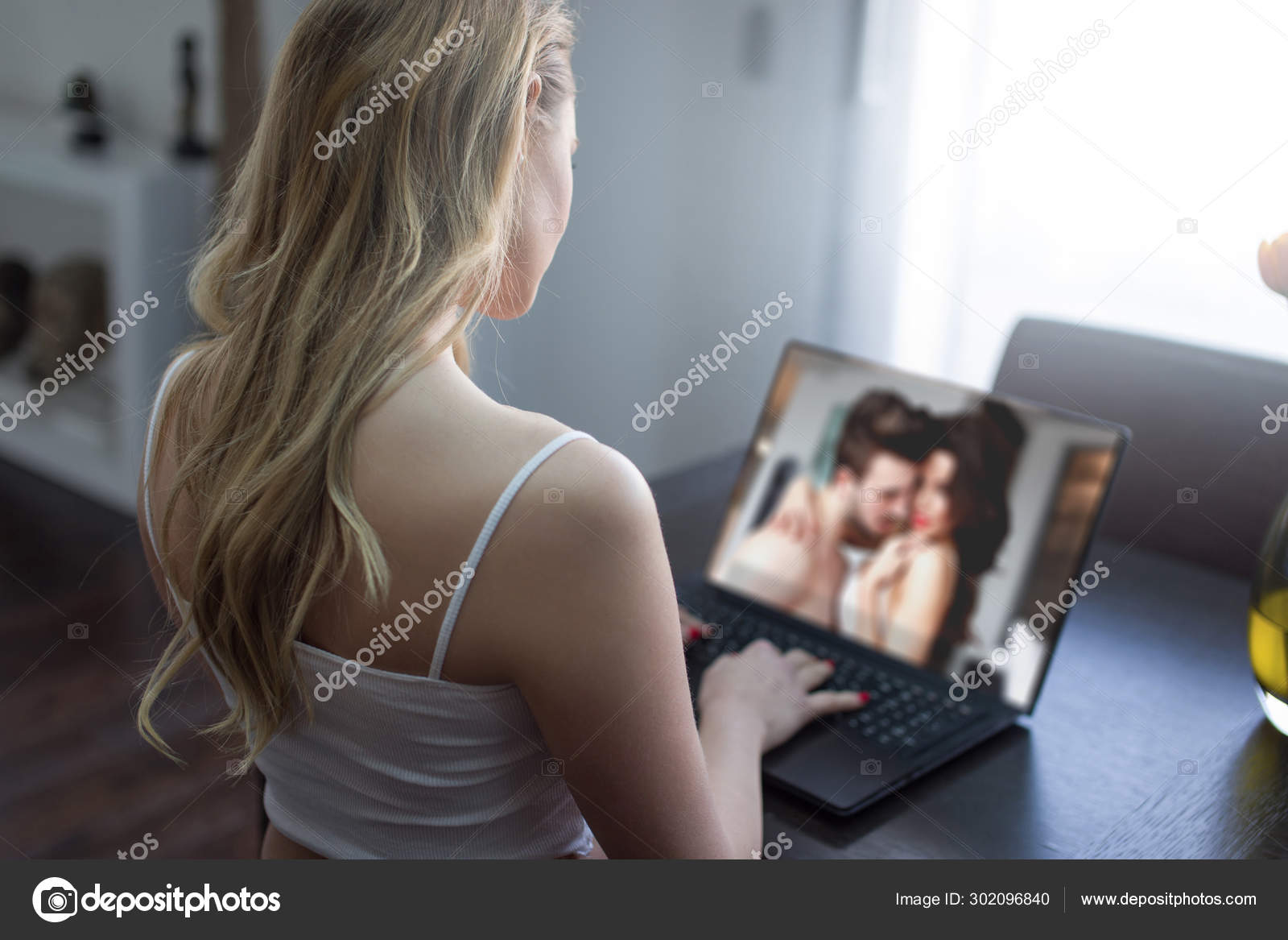 Blonde woman flirting with sexy couple online Stock Photo by ©sakkmesterke 302096840