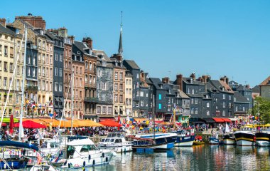 Traditional houses in the harbour of Honfleur. Normandy, France clipart