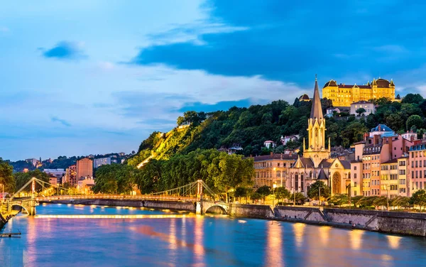 St. George Church and a footbridge across the Saone in Lyon, France — Stock Photo, Image