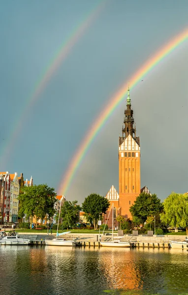 St. Nicholas Cathedral with a rainbow in Elblag, Poland — Stock Photo, Image