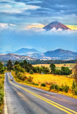 Road towards Popocatepetl Volcano in Mexico clipart