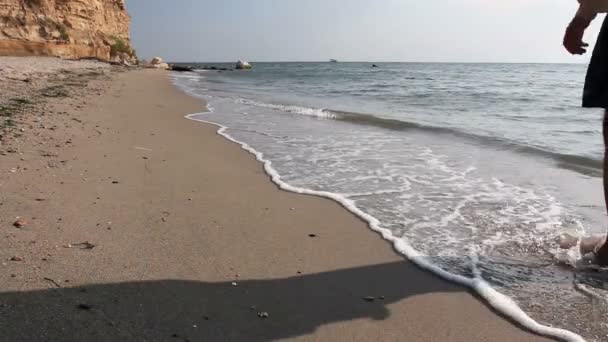 Man Walking Barefoot Trough Shallow Sea Water Enjoying Beautiful Walk — Stock Video