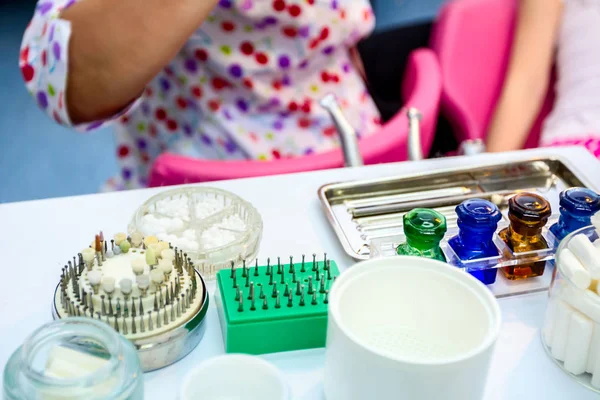 Set of dentist tools and equipment on clinic desktop — Stock Photo, Image