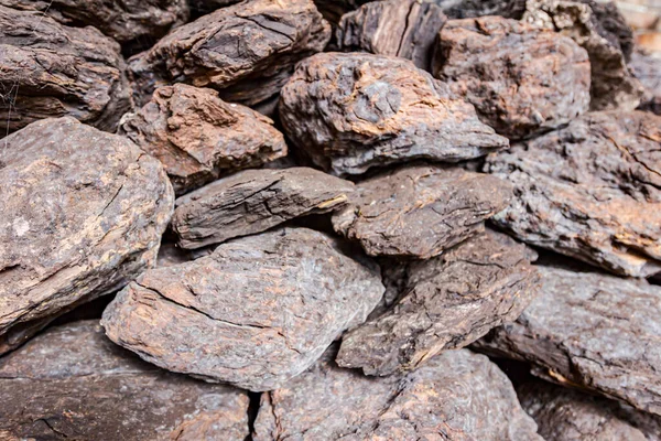 Storage of dry wooden coal, charcoal is piled and ready for ussage.