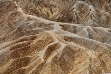 Zabriskie noktası Ölüm Vadisi ABD için onun erosional peyzaj kaydetti Ölüm Vadisi Milli Parkı içinde bulunan amargosa aralığı bir parçasıdır. Bu çökeller 5 milyon yıl önce kurumuş ocağı creek Gölü oluşmuştur