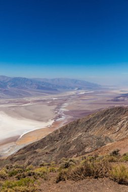 Dante'nin bir bakış açısı Teras tabut zirve, Kuzey tarafında kara dağlar, tepe boyunca 1,669 m yükseklikte Ölüm Vadisi bakan görünümdür. Dante'nin görünümdür yaklaşık 25 km güneyinde ocağı Creek Ölüm Vadisi Milli Parkı'nda.