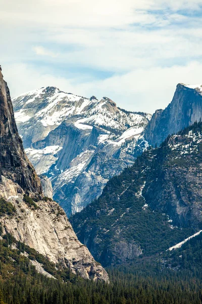 Yosemite National Park is in California\'s Sierra Nevada mountains. Its famed for its giant, ancient sequoia trees, and for Tunnel View, the iconic vista of towering Bridalveil Fall and the granite cliffs of El Capitan and Half Dome.