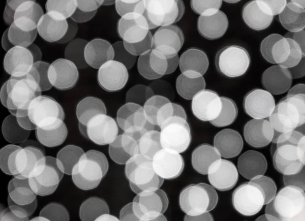 siyah arka plan üzerine beyaz bokeh