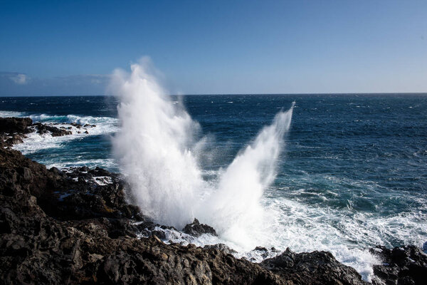 The souffleur at Etang Sale on La Reunion island where waves blow out of th rocks