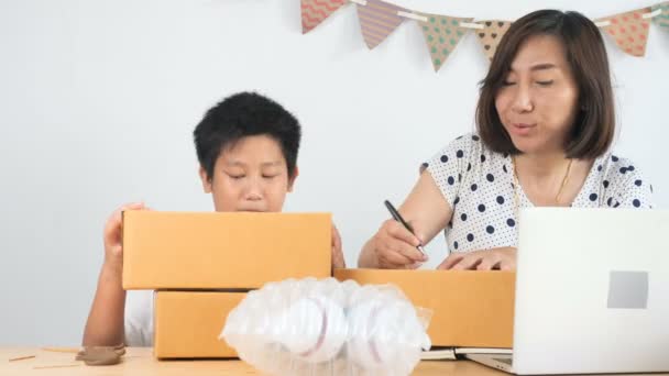 Boy Help His Mother Working Home Asian Woman Working Home — Stock Video