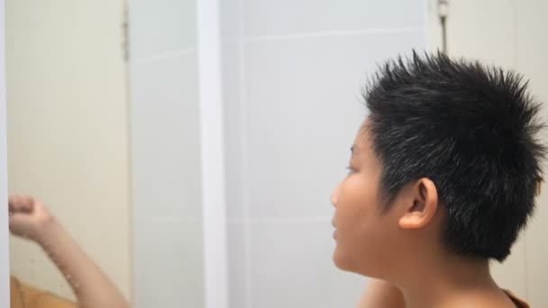 Young Boy Combing His Hair Front Mirror — Stock Video