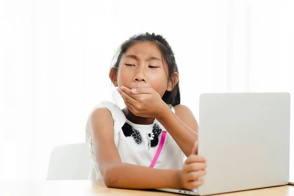 Yawing Asian Girl While Using Laptop Home — Stock Photo, Image