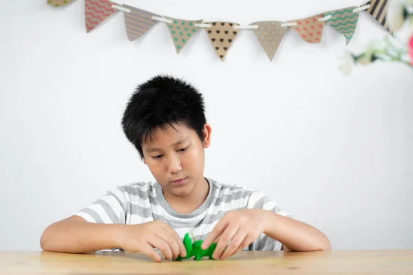 Happy Asian Preteen Boy Playing Dough Home — Stock Photo, Image