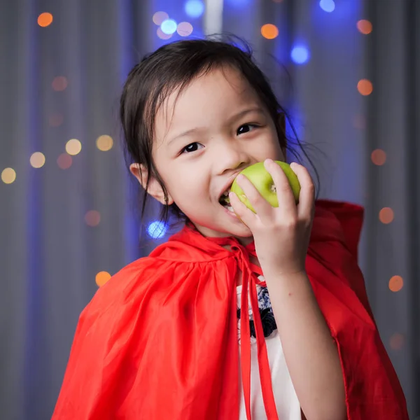 Asian Girl Red Hooded Eating Green Apple Fairy Tale Concept — Stock Photo, Image