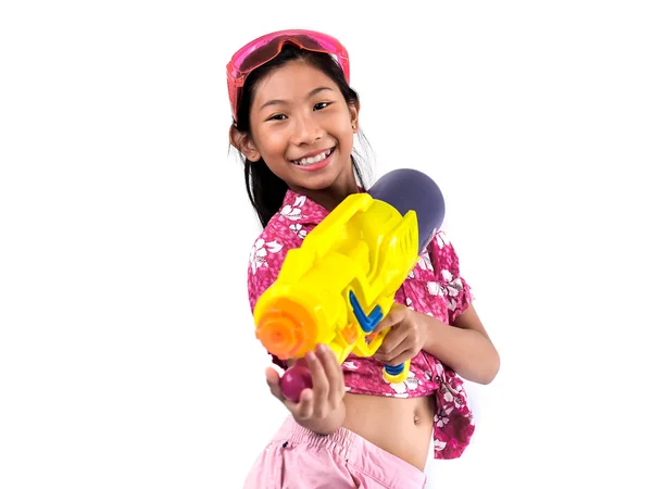 Young Asian girl with water gun on white background, Songkran Fe — Stock Photo, Image