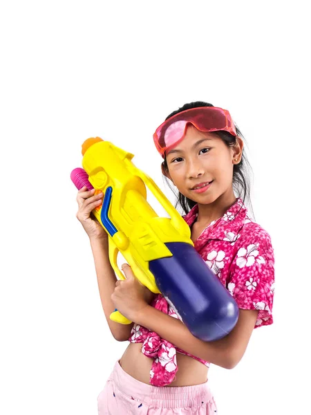 Young Asian girl with water gun on white background, Songkran Fe — Stock Photo, Image