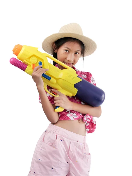 Ung asiatisk tjej med vattenpistol på vit bakgrund, Songkran Fe — Stockfoto