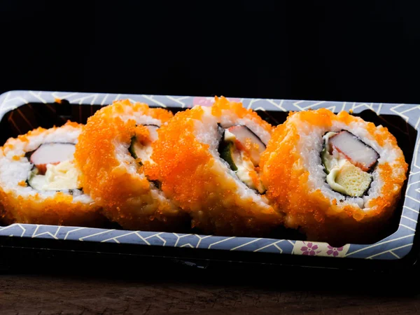 Sushi maki california roll son color naranja tono de ánimo. repetir pa — Foto de Stock