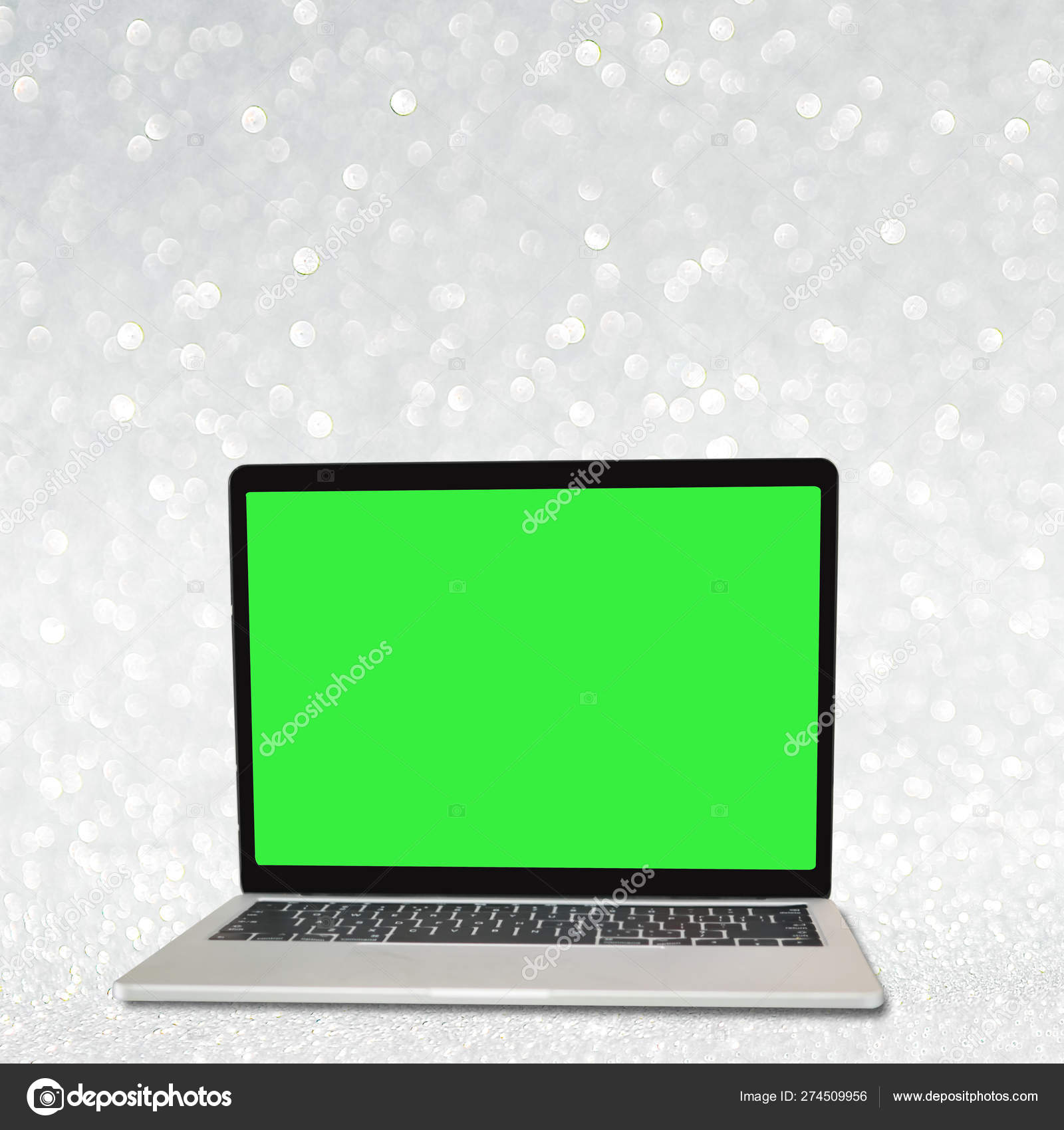 Green Screen Laptop With White Glitter Bokeh Background Stock Photo C Jayjaynaenae