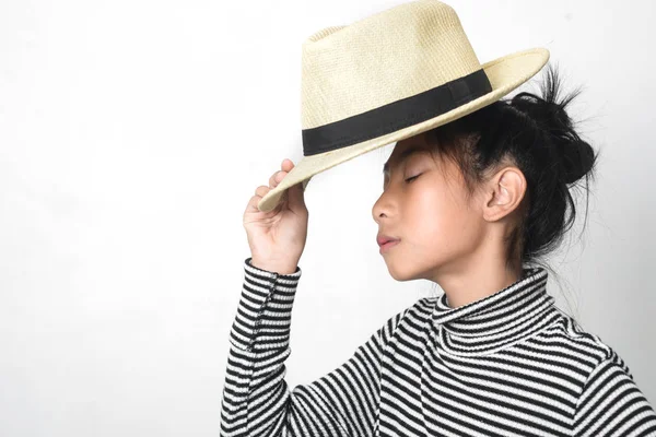 Happy Asian girl waering turtle neck and straw hat on white back — Stock Photo, Image