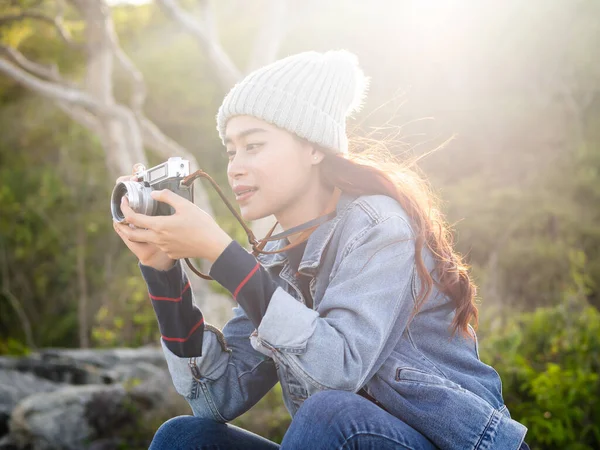 Happy Asian woman vintage camera with nature background, camping — Stockfoto