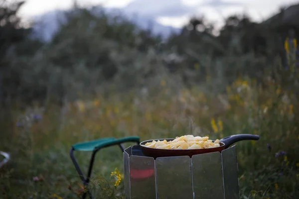 Cooking while Hiking on the burner in camping utensils