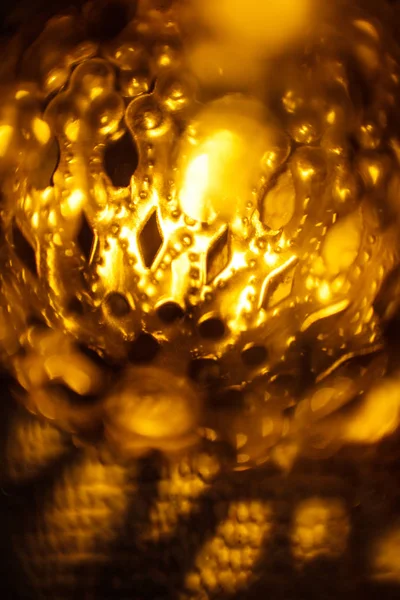 Festive Garland Carved Metal Bowl Lit Golden Light Bronze Balls — Stock Photo, Image
