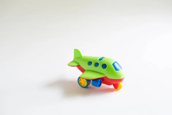 Toy Green Plastic Airplane Colored Red Blue Yellow Details White — Stock Photo, Image