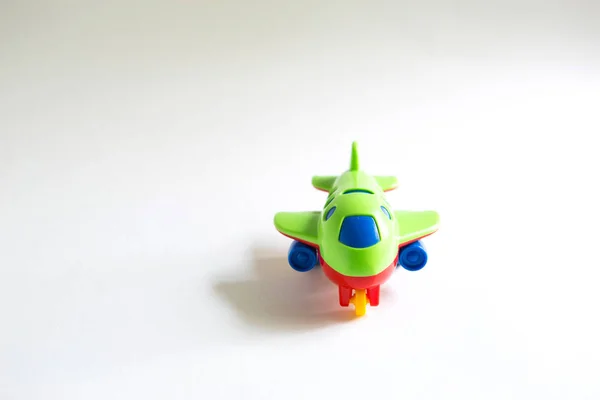 Toy Green Plastic Airplane Colored Red Blue Yellow Details White — Stock Photo, Image