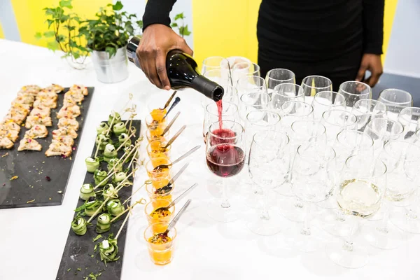 Waitress Pouring Red Wine Glasses Buffet Table White Cloth — Stock Photo, Image