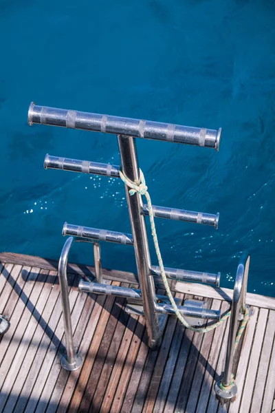 Stainless Steel Dive Boat Ladder in Push Pit with Sea in the Background