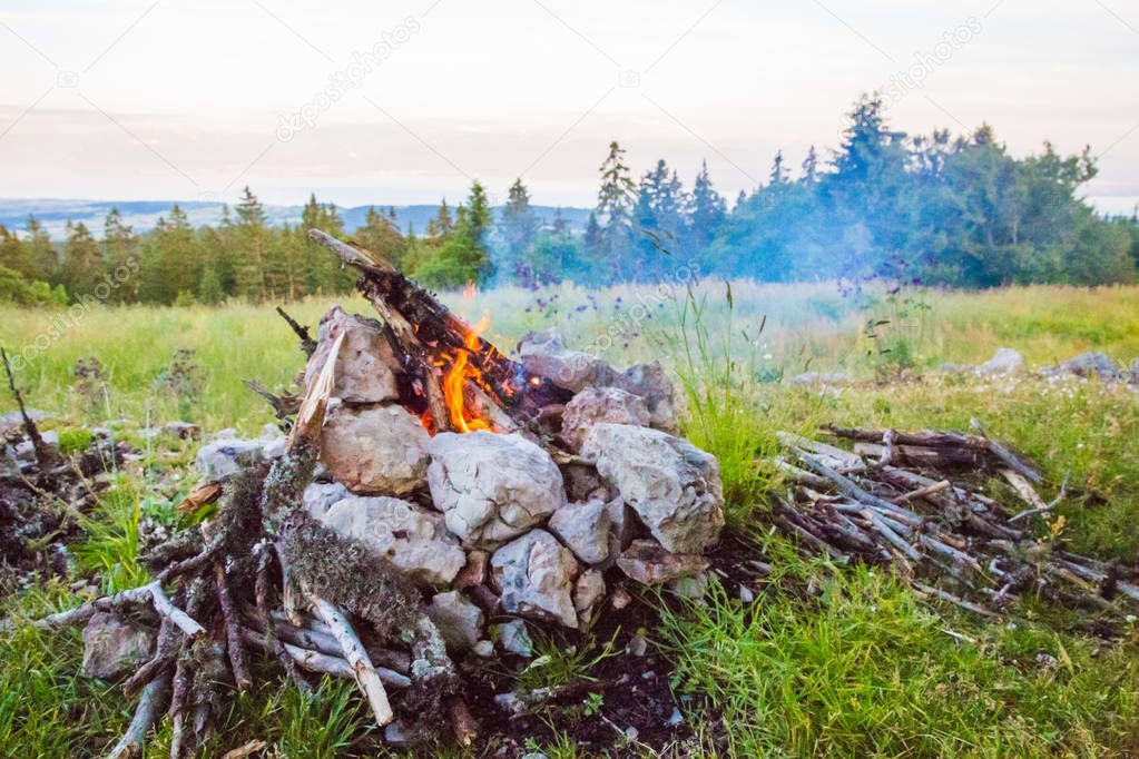 Outdoors Fire with Stone Hearth with Alps and Mont-Blanc Mountains in the Background
