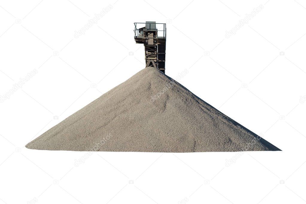Conveyor over heaps of gravel, isolated on a white background with a clipping path.