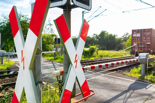 Closed Barrier Railway Crossing Andrew Cross Visible Blurred Red Wagon — Zdjęcie stockowe