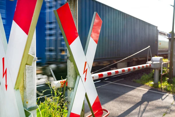 Closed Barrier Railroad Crossing Andrew Cross Visible Blurred Blue Wagon — Stockfoto