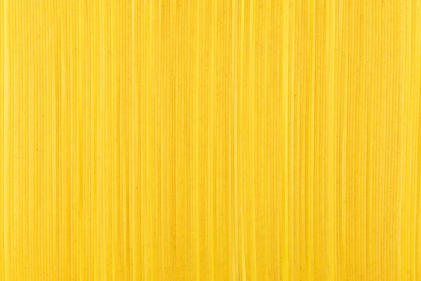 Hintergrund Aus Langen Gelben Spaghetti Draufsicht — Stockfoto