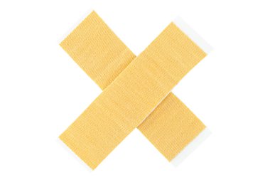 Bir haç şeklinde klasik kahverengi yara bantları, bir kırpma yolu ile beyaz bir arka planda izole.