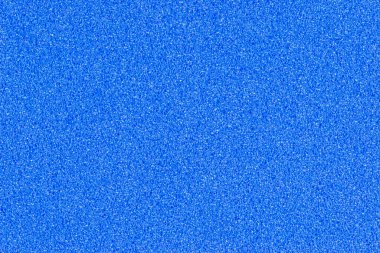 Arkaplan, arkaplan veya tasarım için gerçek köpük sünger kağıdının dokusuyla mavi bir gradyan renginin makro fotoğrafı.
