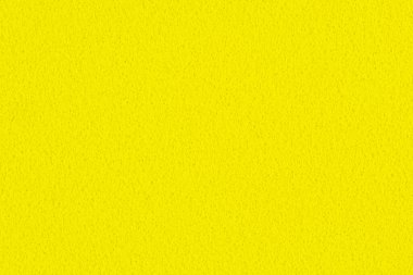 Arkaplan, arkaplan veya tasarım için gerçek köpük sünger kağıdının dokusuyla sarı bir gradyan renginin makro fotoğrafı.