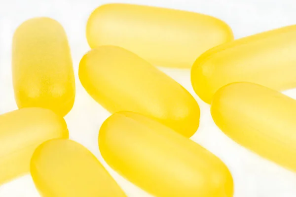 Macro Shot Yellow Gelatin Capsules Isolated White Background — Stock Photo, Image