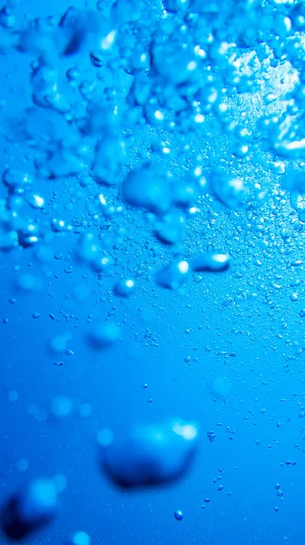 water bubbles in the blue sea