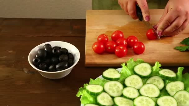 Female Hands Cut Cherry Tomatoes Make Vegetable Salad — Stock Video