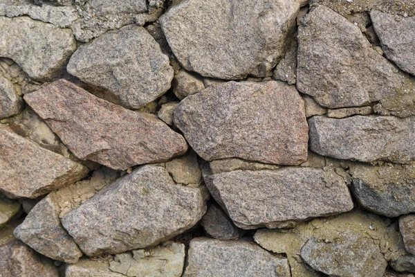Taştan bir duvar bir bölümünü Granit taş.