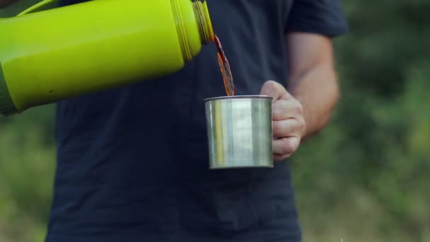 Men Hands Pour Tea Thermos Mug Close — Stock Video