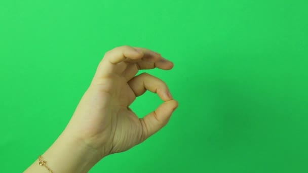 Female Hand Green Background Show Gesture Close — Stock Video