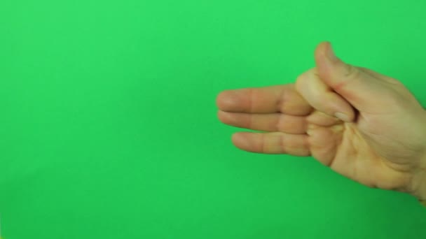 Männliche Hand Auf Grünem Hintergrund Zeigt Gesten Nahaufnahme — Stockvideo