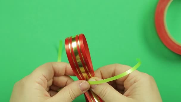 Women Hands Tie Form Blank Red Ribbon Green Tape Make — Stock Video