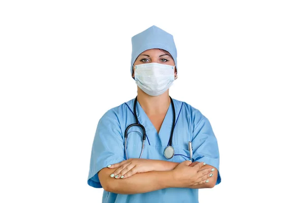 Женщина-врач в маске со скрещенными руками на белом фоне . — стоковое фото